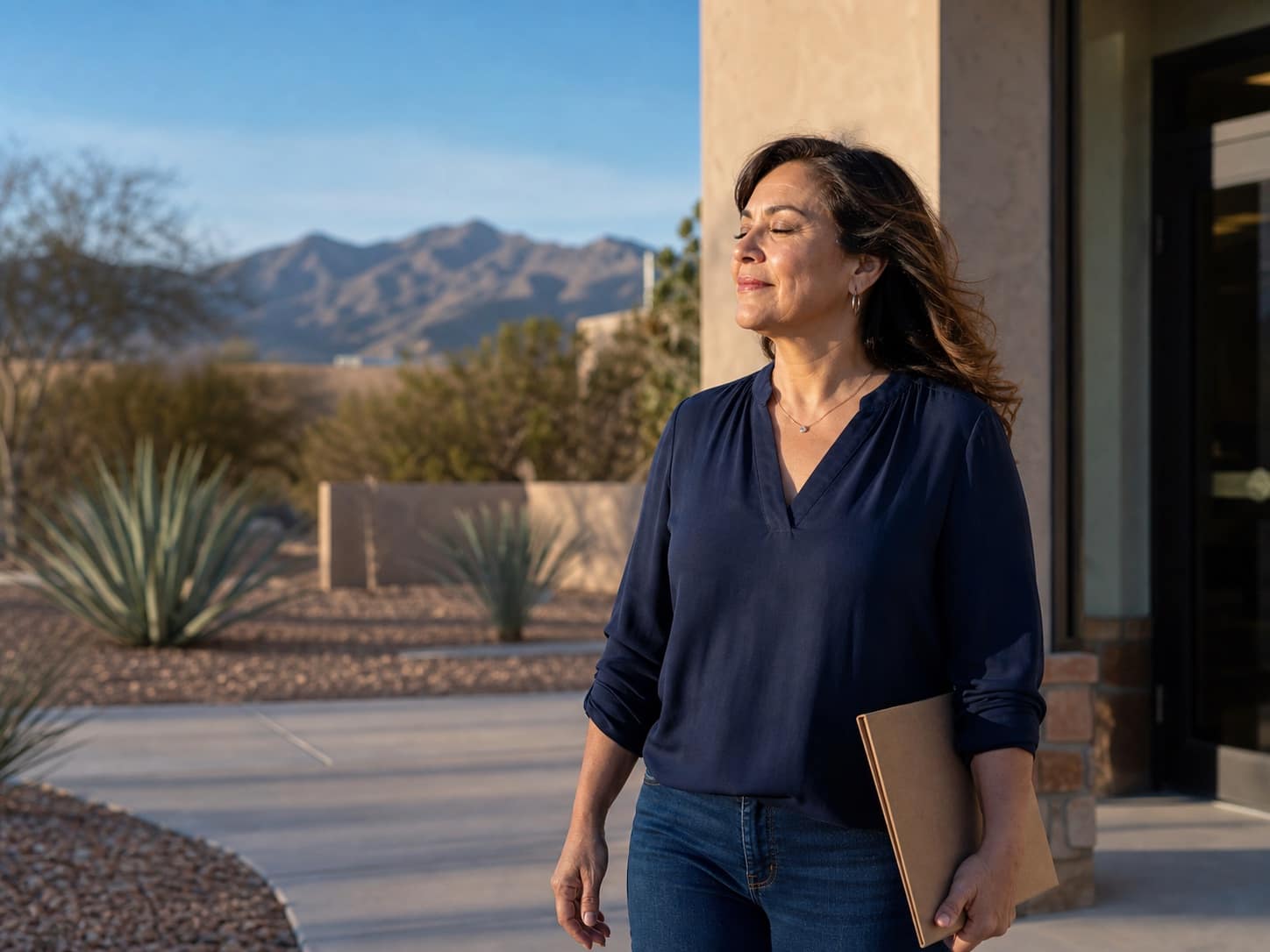 A relieved El Paso homeowner outside after completing her home sale